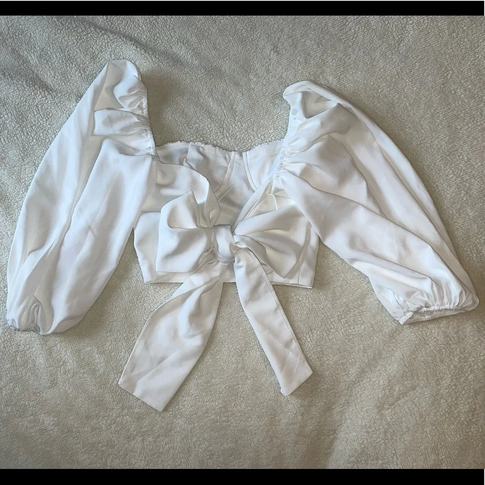 White long sleeve blouse with puff sleeves and a tie back. - Picture 4 of 5